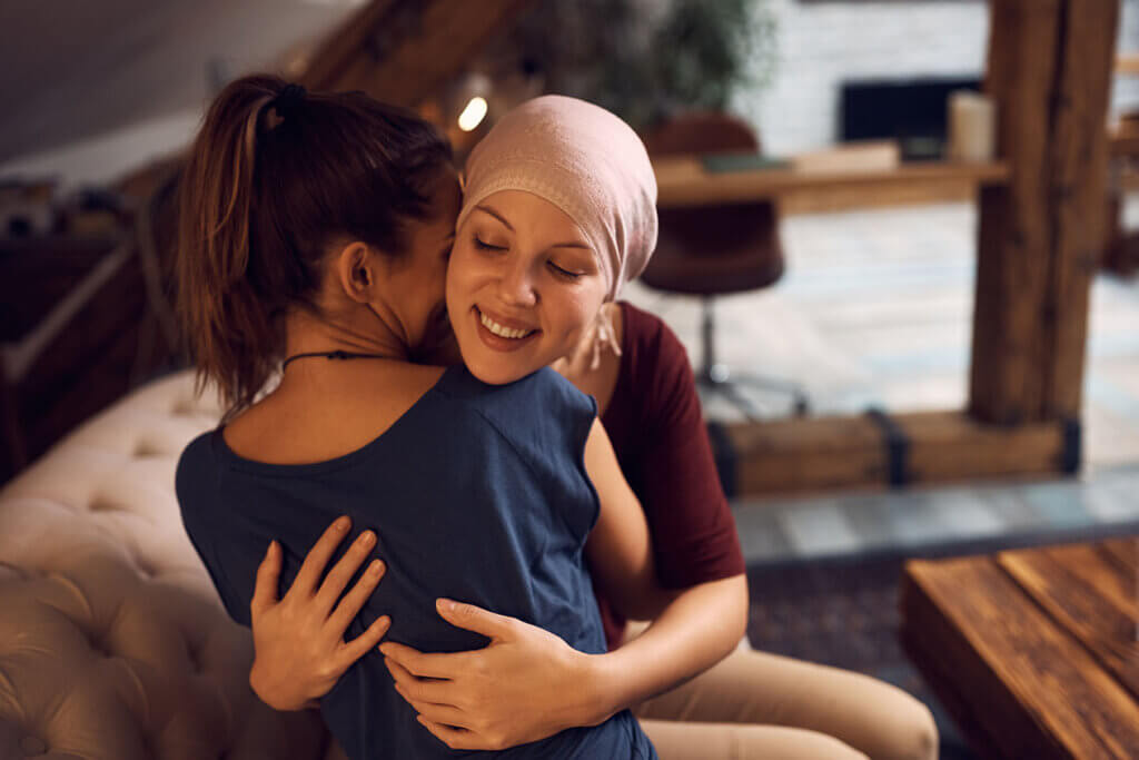 visiting friend hug cancer